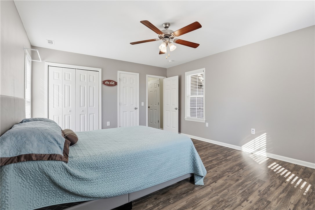 202 C-1-231 Pelzer, SC 29669 - Photo 20 of 49 This inviting bedroom offers comfort and style with durable flooring and ample natural light.