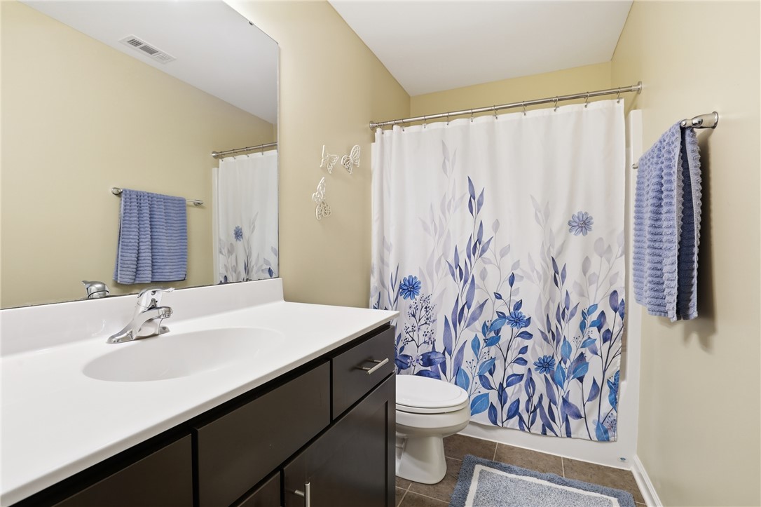 202 C-1-231 Pelzer, SC 29669 - Photo 21 of 49 This clean and inviting bathroom features a single vanity, offering both style and functionality.