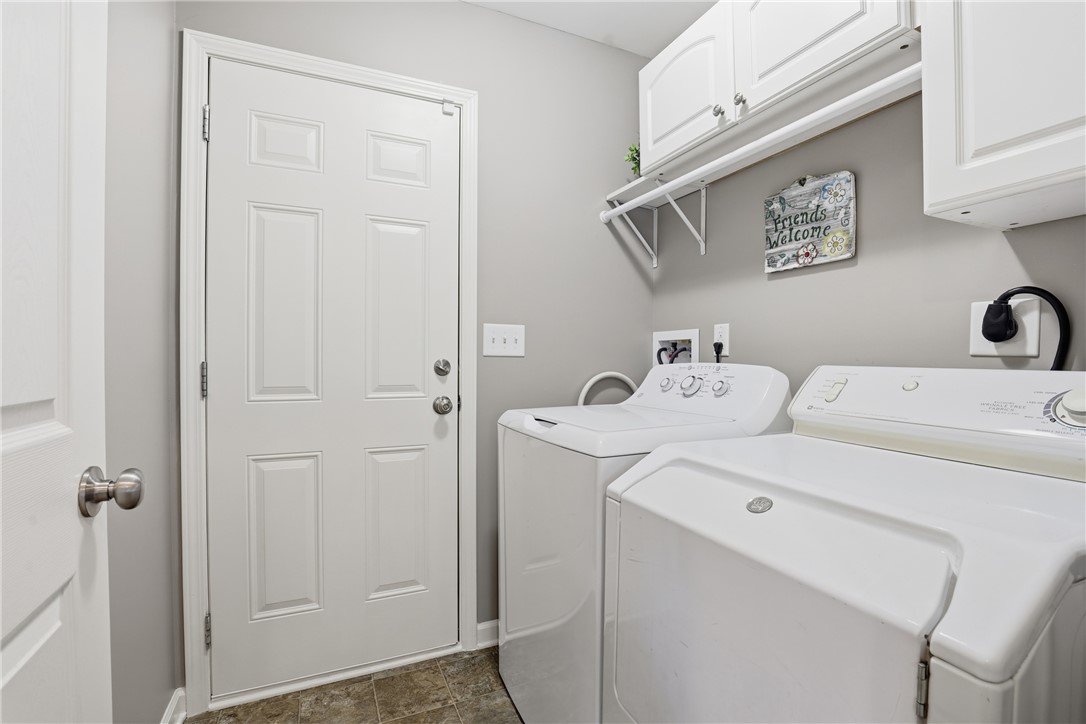 202 C-1-231 Pelzer, SC 29669 - Photo 24 of 49 This functional laundry room offers convenient appliances and practical overhead storage.