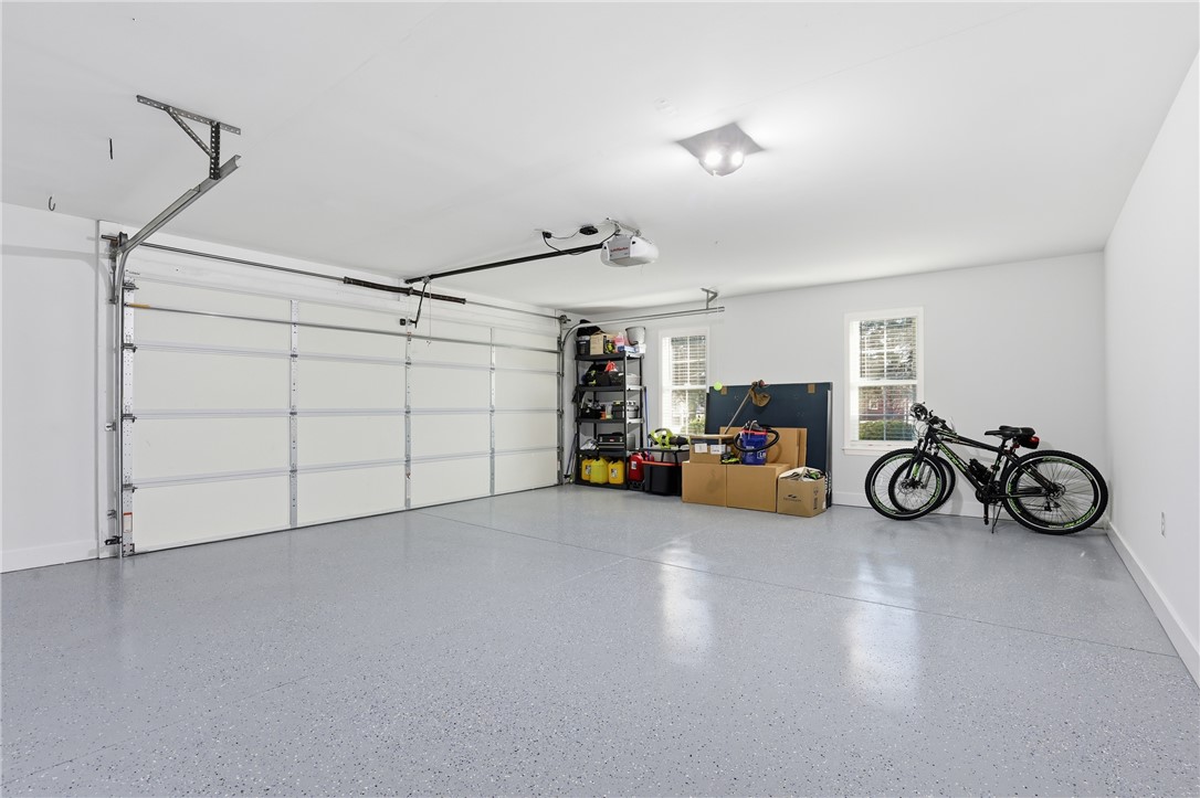 202 C-1-231 Pelzer, SC 29669 - Photo 26 of 49 This spacious garage offers ample room for parking and storage.