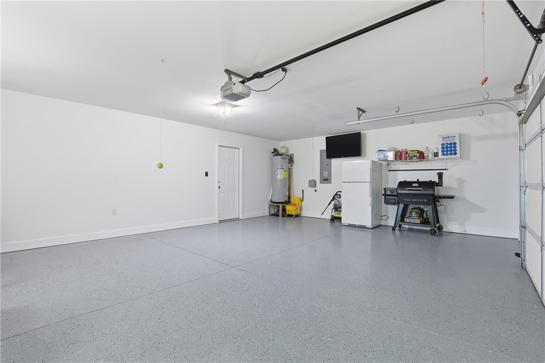 202 C-1-231 Pelzer, SC 29669 - Photo 27 of 49 This spacious garage offers ample room for vehicles and storage, with a clean and durable floor.
