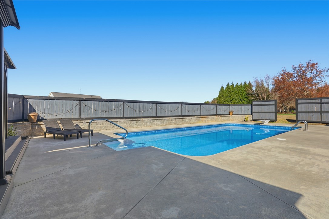 202 C-1-231 Pelzer, SC 29669 - Photo 29 of 49 This private outdoor space features a pristine pool, perfect for relaxation and recreation.