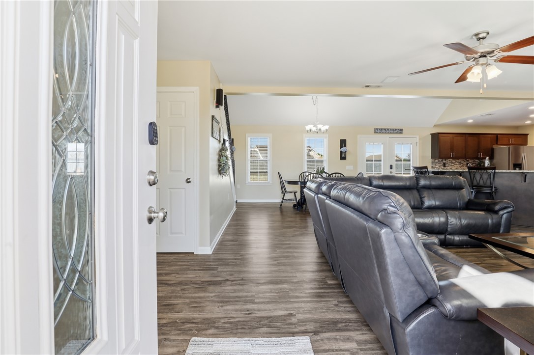 202 C-1-231 Pelzer, SC 29669 - Photo 3 of 49 Enter this inviting living area featuring durable flooring and an open layout perfect for gatherings.