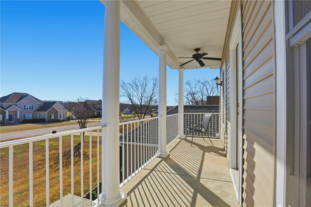202 C-1-231 Pelzer, SC 29669 - Photo 35 of 49 Relax outdoors on this inviting porch, offering serene views of the neighborhood.