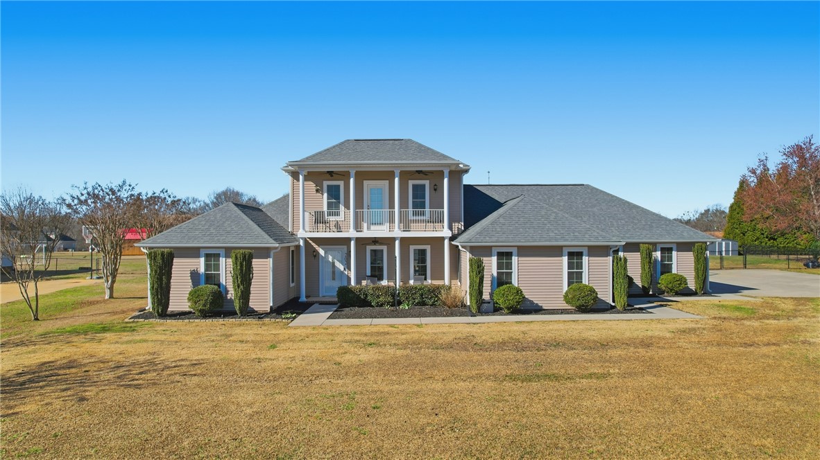 202 C-1-231 Pelzer, SC 29669 - Photo 37 of 49 This charming home offers a spacious exterior with inviting balconies and mature landscaping.
