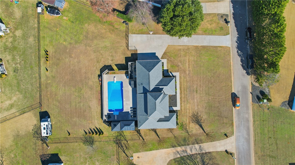 202 C-1-231 Pelzer, SC 29669 - Photo 39 of 49 An aerial view showcases a well-maintained property with a sparkling pool and ample outdoor space.