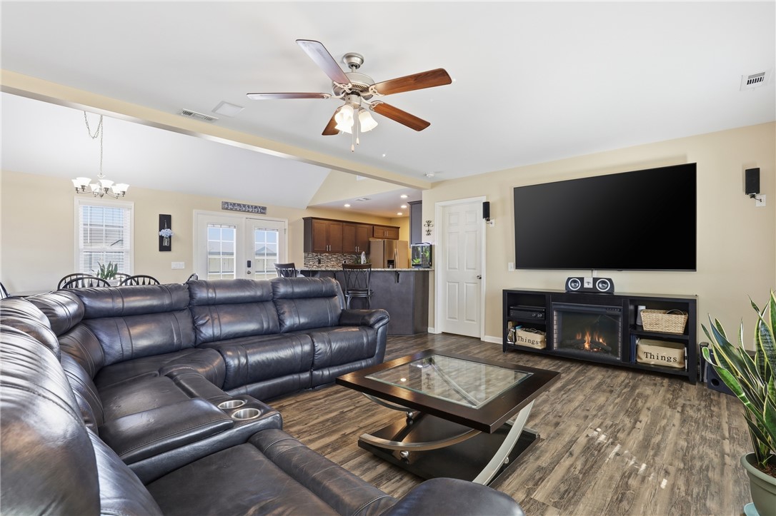 202 C-1-231 Pelzer, SC 29669 - Photo 4 of 49 This living area offers a relaxed atmosphere, featuring an open concept design and durable flooring.
