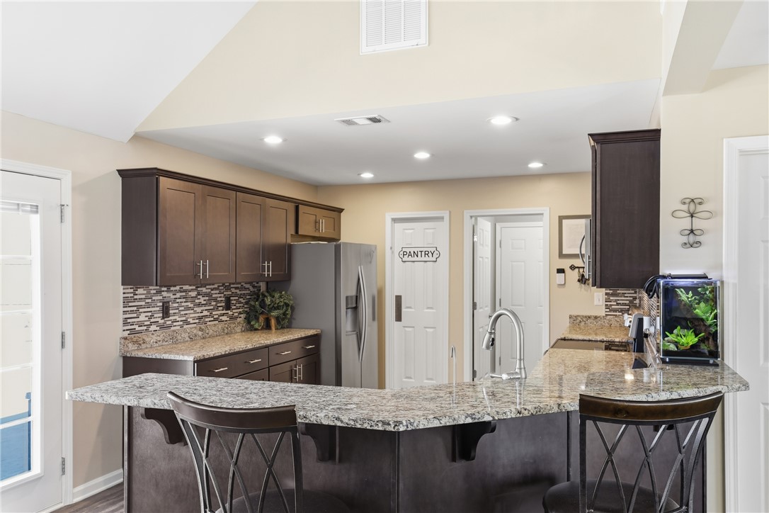 202 C-1-231 Pelzer, SC 29669 - Photo 6 of 49 This spacious kitchen offers ample counter space and convenient storage solutions.