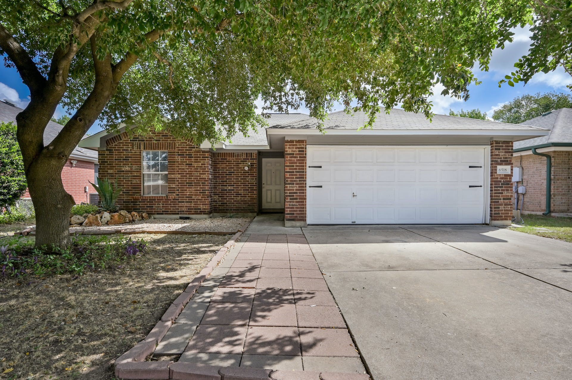 6518 Colton-Bluff Springs Road Austin, TX 78744 - Photo 1 of 1 a view of a garage