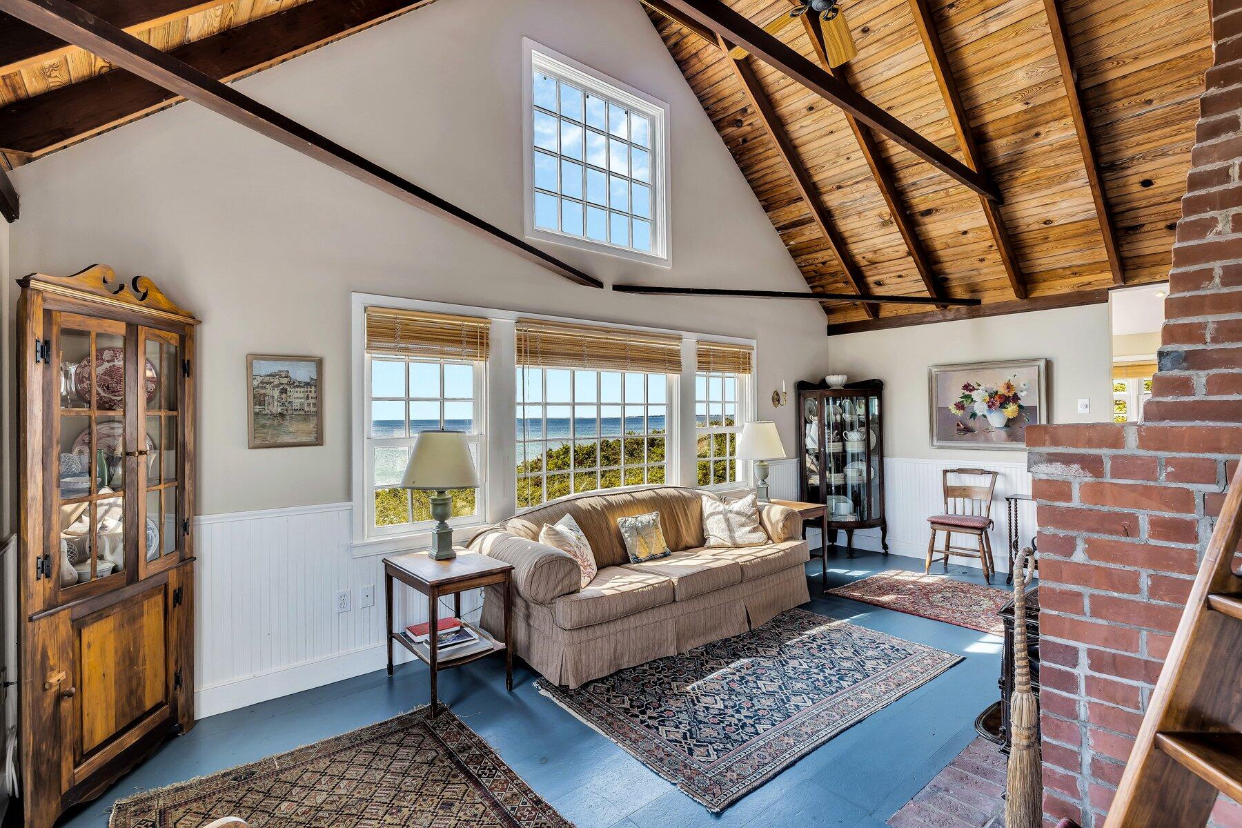 6 Bay View Path Truro, MA 02666 - Photo 12 of 57 a living room with furniture and a rug