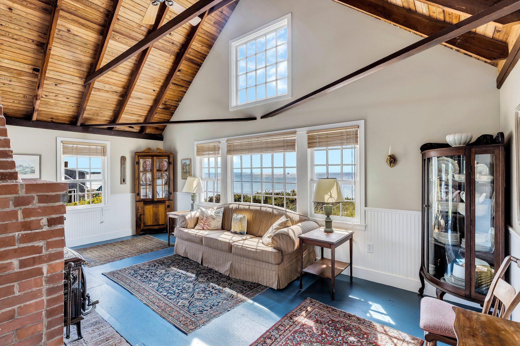 6 Bay View Path Truro, MA 02666 - Photo 13 of 57 a living room with furniture and a rug