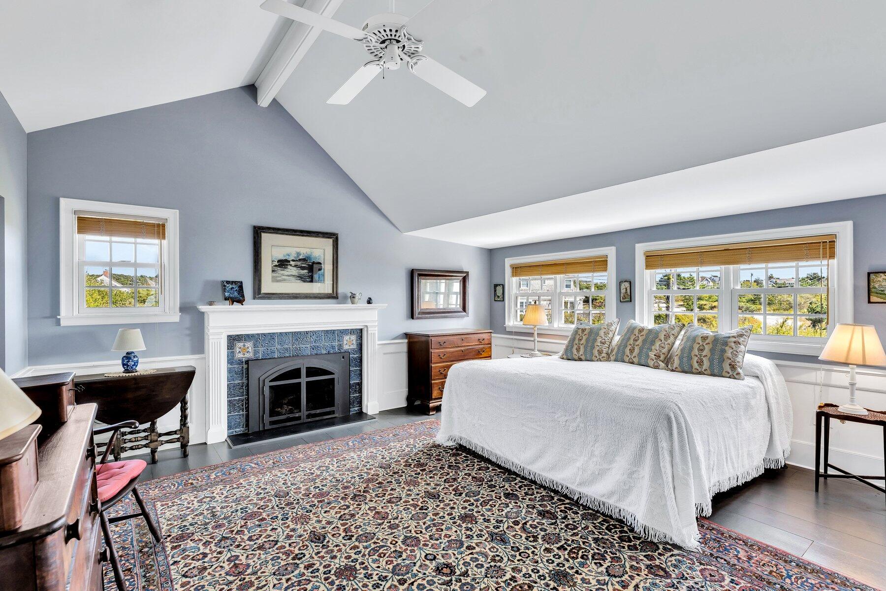 6 Bay View Path Truro, MA 02666 - Photo 19 of 57 a bedroom with a bed and a fireplace