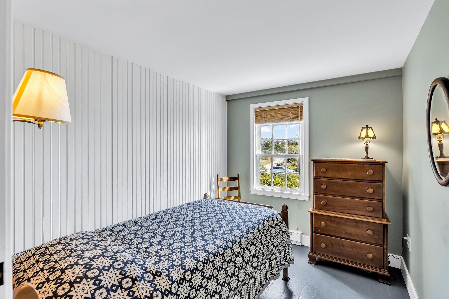 6 Bay View Path Truro, MA 02666 - Photo 23 of 57 a bedroom with a bed and a window