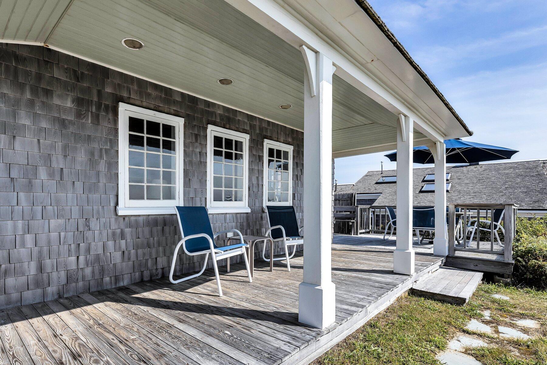 6 Bay View Path Truro, MA 02666 - Photo 29 of 57 a patio with table and chairs