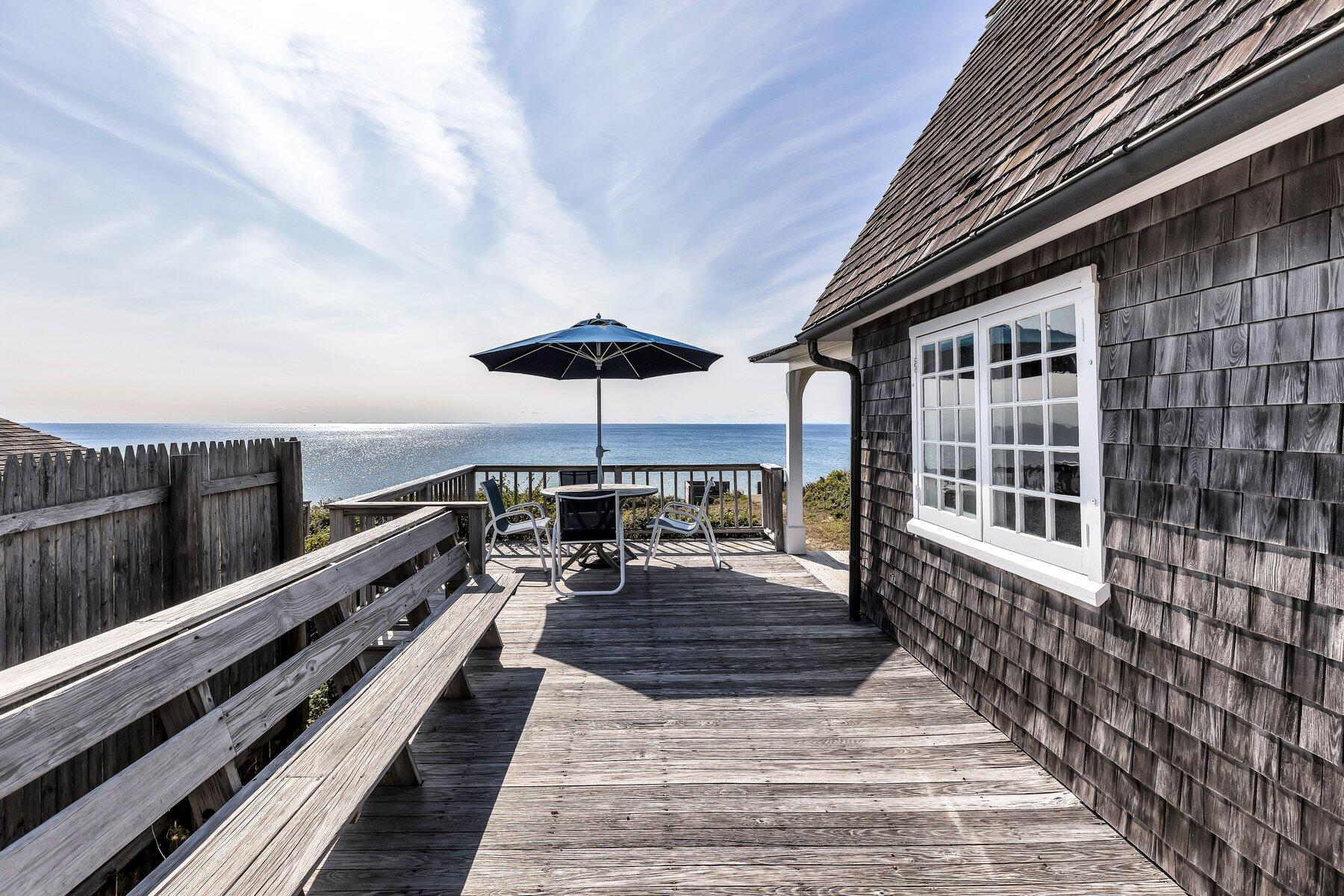 6 Bay View Path Truro, MA 02666 - Photo 30 of 57 a view of a balcony with chairs