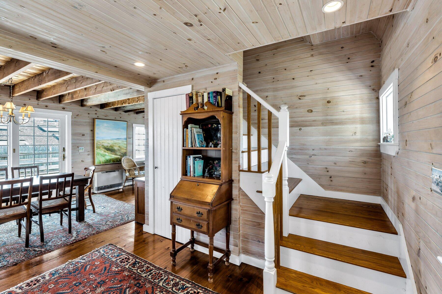 6 Bay View Path Truro, MA 02666 - Photo 32 of 57 a living room with furniture a rug and wooden floor