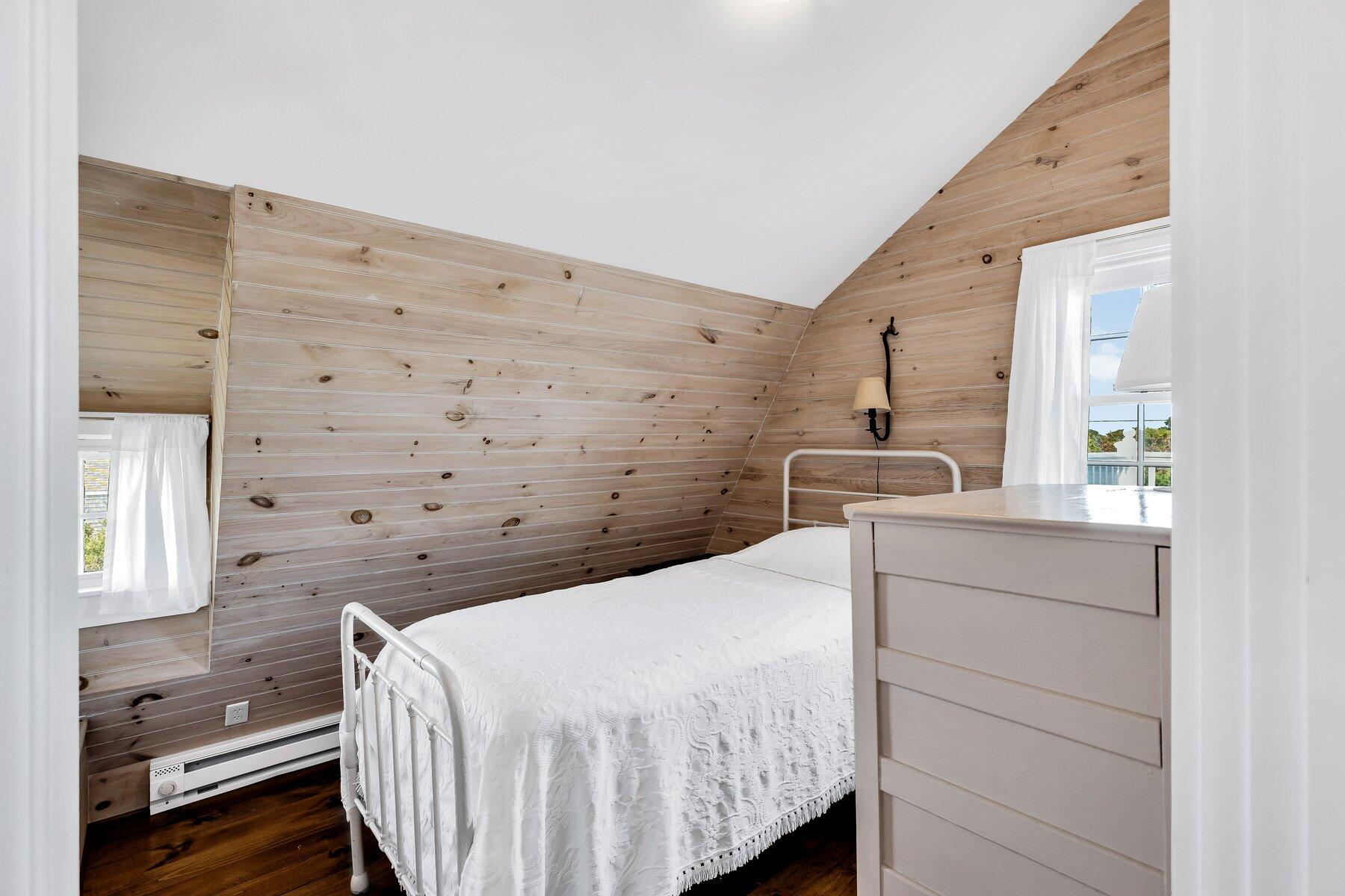 6 Bay View Path Truro, MA 02666 - Photo 43 of 57 a bedroom with a bed and a dresser