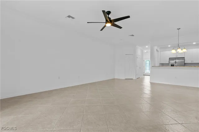 a view of a livingroom with a ceiling fan