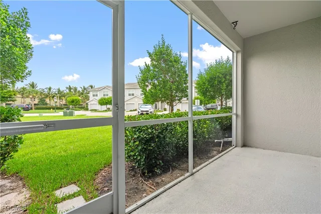 a view of a porch with a yard