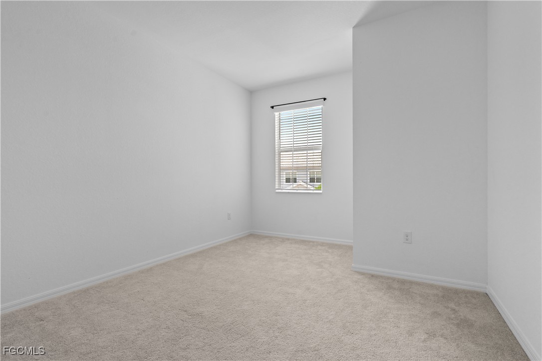 12557 Westhaven Way Fort Myers, FL 33913 - Photo 21 of 24 an empty room with a windows