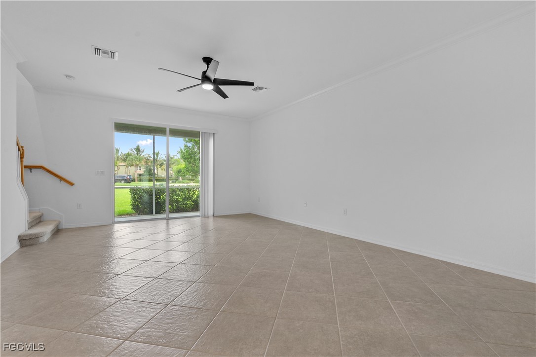 12557 Westhaven Way Fort Myers, FL 33913 - Photo 10 of 24 wooden floor in an empty room with a window