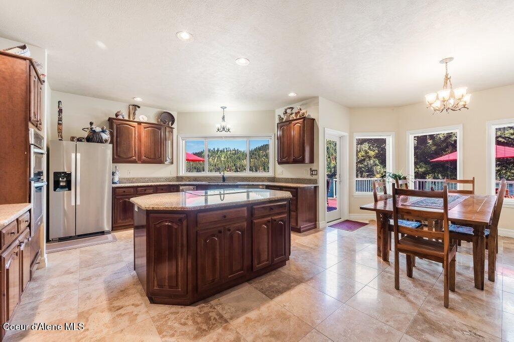 63200 South Powderhorn Bay Road Harrison, ID 83833 - Photo 23 of 64 Beautiful travertine floors