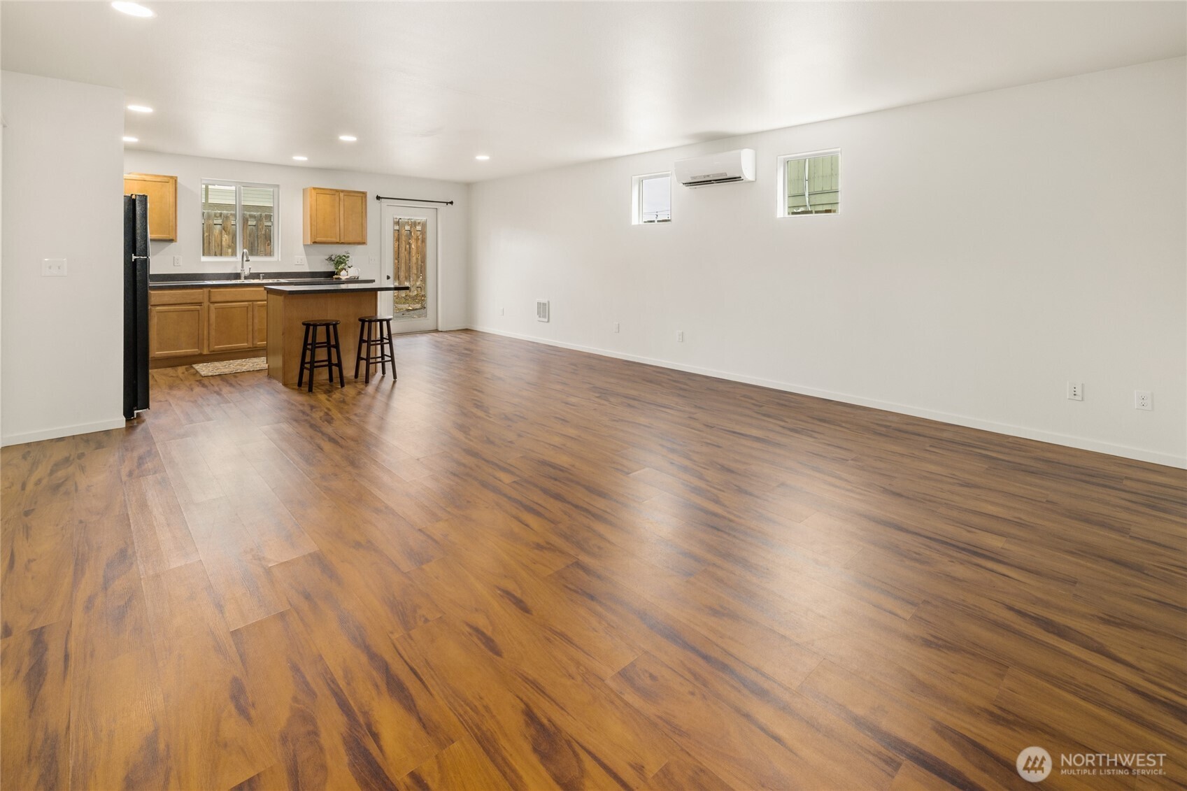 335 Pacific Loop Kittitas, WA 98934 - Photo 11 of 39 a view of a kitchen with furniture and wooden floor