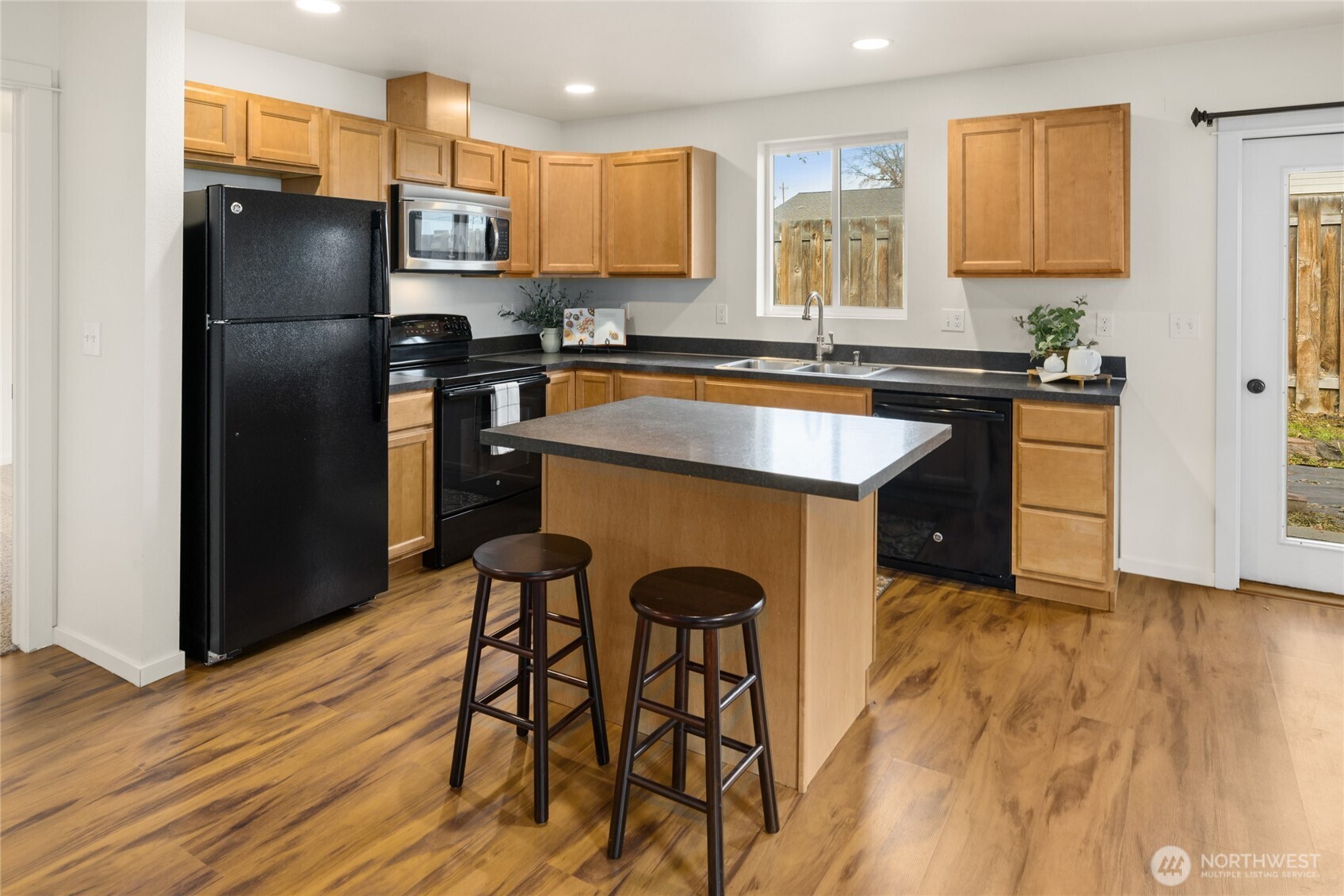 335 Pacific Loop Kittitas, WA 98934 - Photo 15 of 39 a kitchen with stainless steel appliances granite countertop a refrigerator a stove a sink and a microwave