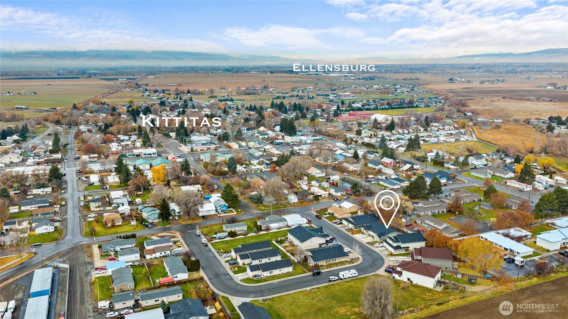 335 Pacific Loop Kittitas, WA 98934 - Photo 3 of 39 an aerial view of residential building with parking space