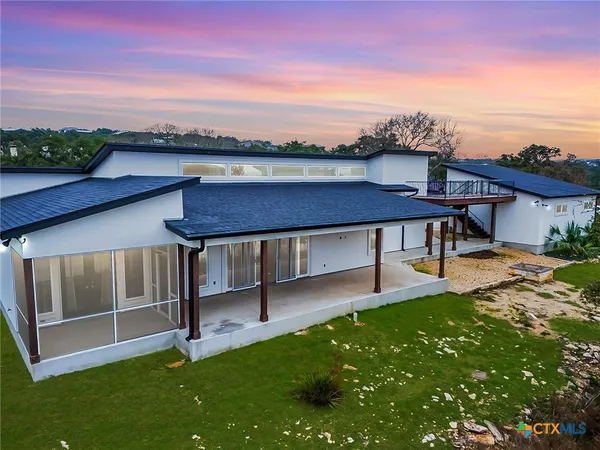 a view of a terrace with chairs