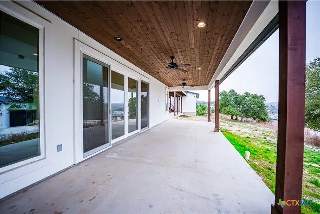 a view of a terrace with a garden
