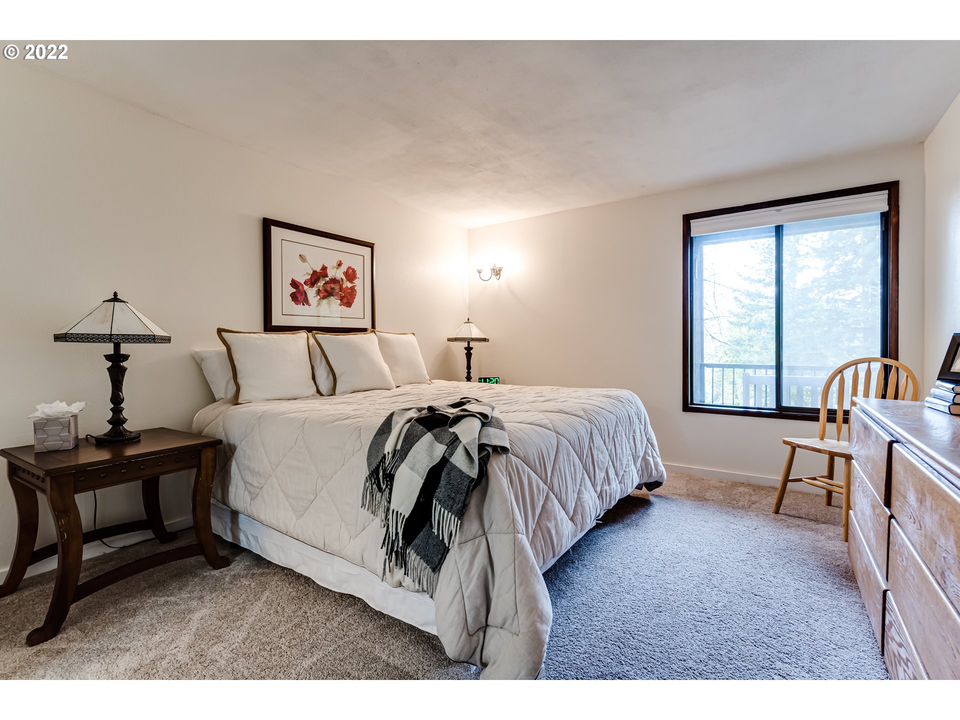 2695 Woodstone Place Eugene, OR 97405 - Photo 18 of 23 a bedroom with a bed and a table