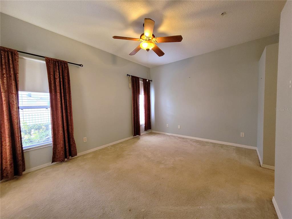 673 Sandy Neck Lane, Unit 101 Altamonte Springs, FL 32714 - Photo 14 of 39 a view of an empty room with a window