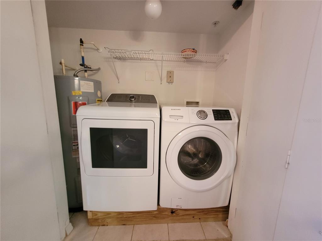 673 Sandy Neck Lane, Unit 101 Altamonte Springs, FL 32714 - Photo 29 of 39 a utility room with dryer and washer