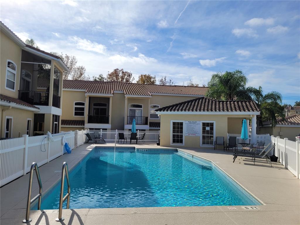 673 Sandy Neck Lane, Unit 101 Altamonte Springs, FL 32714 - Photo 3 of 39 a view of a house with swimming pool and sitting area