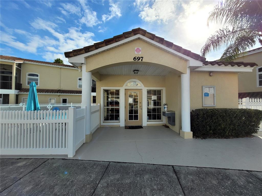 673 Sandy Neck Lane, Unit 101 Altamonte Springs, FL 32714 - Photo 33 of 39 front view of a house with a yard