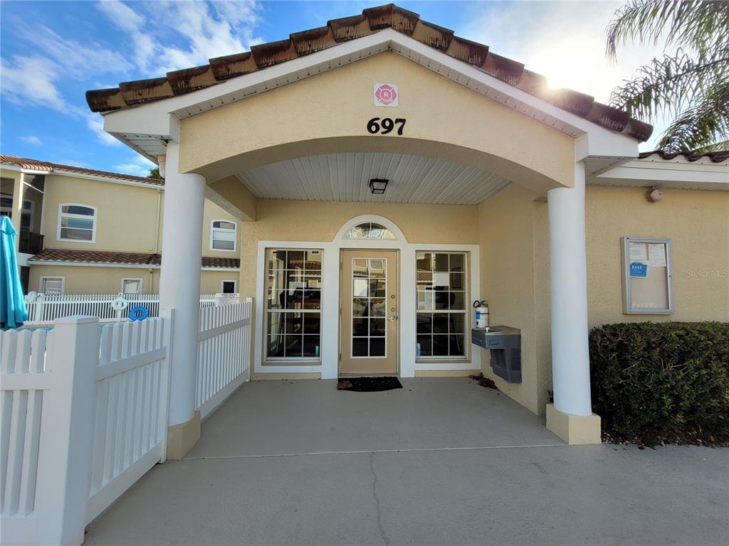 673 Sandy Neck Lane, Unit 101 Altamonte Springs, FL 32714 - Photo 34 of 39 a front view of a house with glass doors