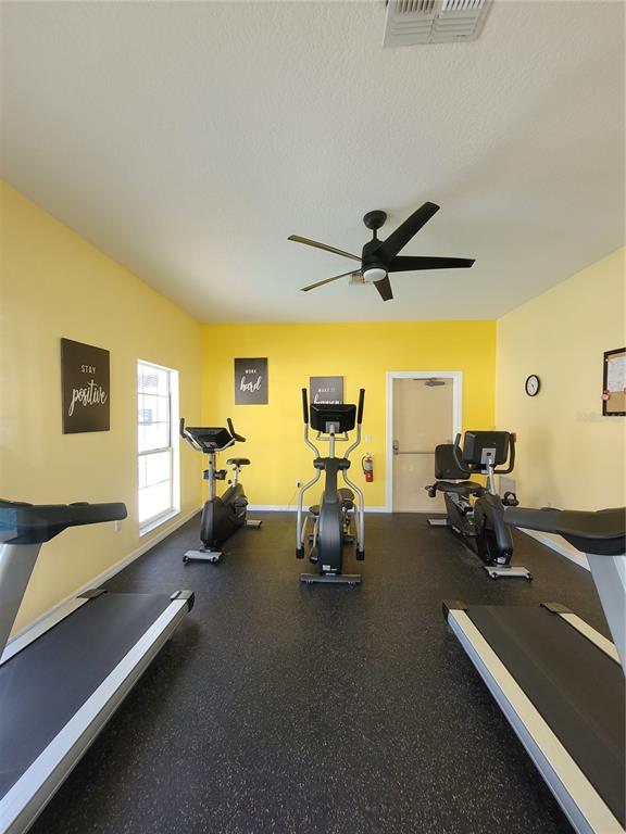 673 Sandy Neck Lane, Unit 101 Altamonte Springs, FL 32714 - Photo 36 of 39 a view of a room with gym equipment