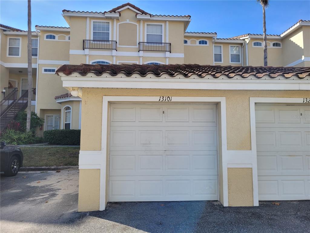 673 Sandy Neck Lane, Unit 101 Altamonte Springs, FL 32714 - Photo 6 of 39 a front view of a house with a street