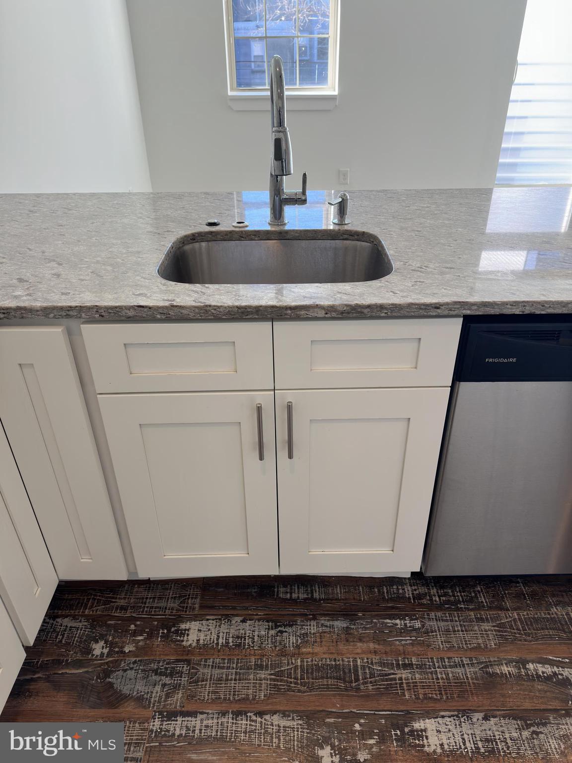 2206 North Front Street, Unit 2B Philadelphia, PA 19133 - Photo 25 of 28 a kitchen with a sink and cabinets