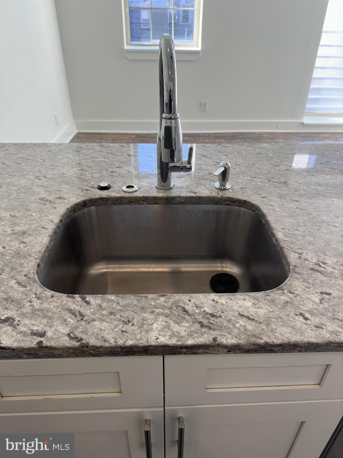 2206 North Front Street, Unit 2B Philadelphia, PA 19133 - Photo 26 of 28 a bathroom with sink and granite