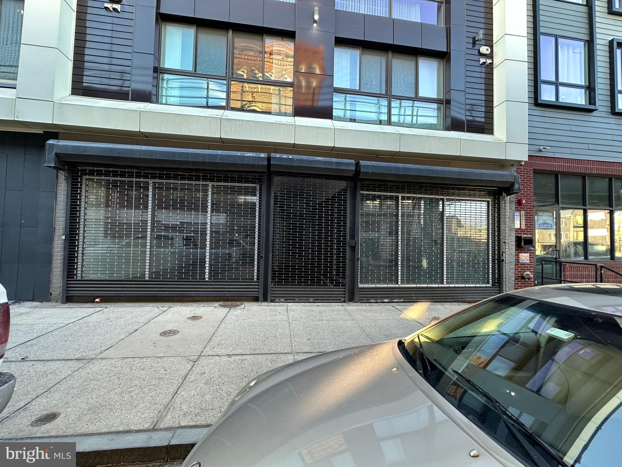 2206 North Front Street, Unit 2B Philadelphia, PA 19133 - Photo 27 of 28 a view of a brick house with large windows