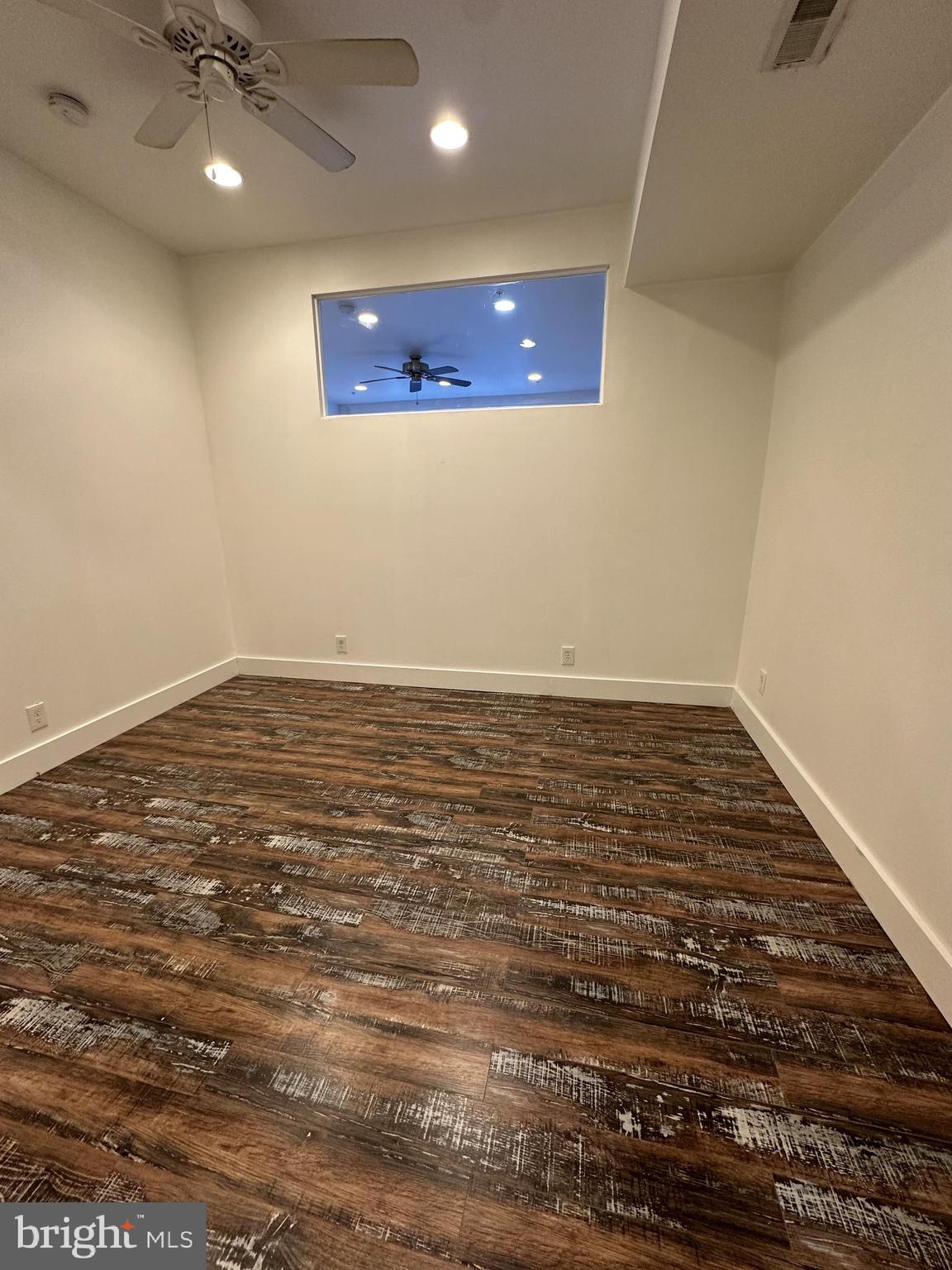 2206 North Front Street, Unit 2B Philadelphia, PA 19133 - Photo 6 of 28 wooden floor in an empty room