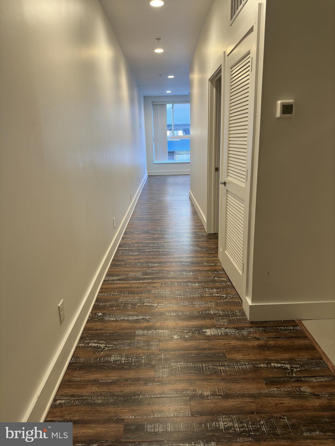 2206 North Front Street, Unit 2B Philadelphia, PA 19133 - Photo 10 of 28 a view of a hallway with wooden floor and staircase