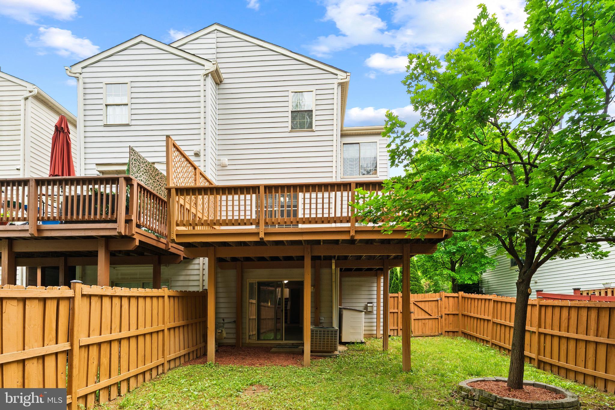 1709 Woodruff Way Frederick, MD 21701 - Photo 31 of 42 a front view of a house with a garden