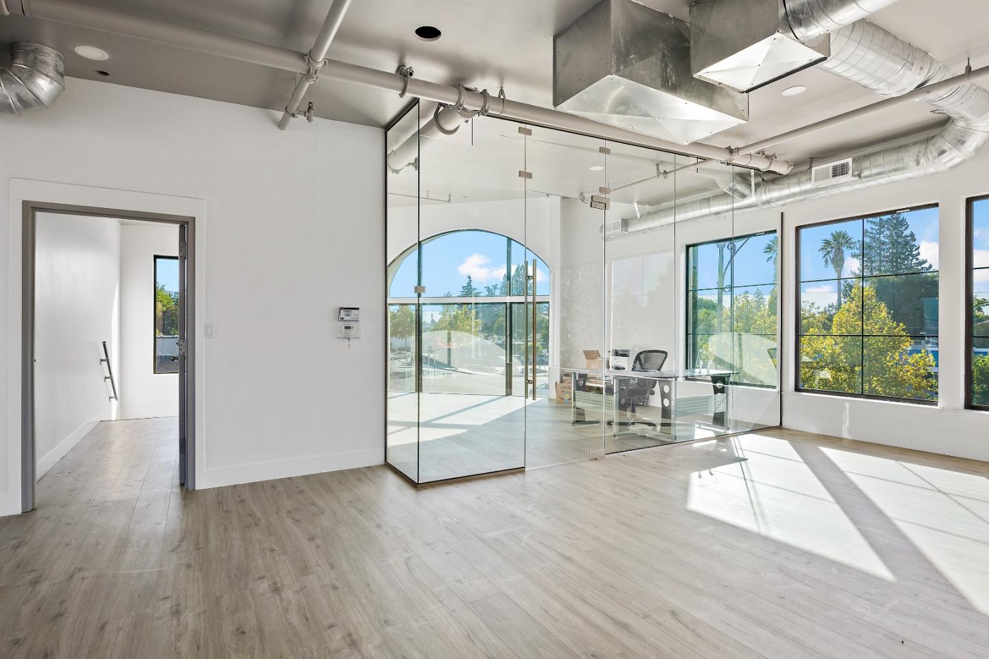2220 Winchester Boulevard Campbell, CA 95008 - Photo 16 of 26 a living room with hardwood floor and a ceiling fan