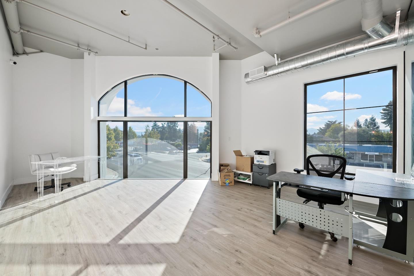 2220 Winchester Boulevard Campbell, CA 95008 - Photo 17 of 26 a living room with furniture and a floor to ceiling window