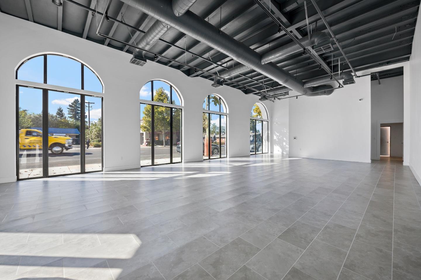 2220 Winchester Boulevard Campbell, CA 95008 - Photo 5 of 26 a view of an empty room with wooden floor