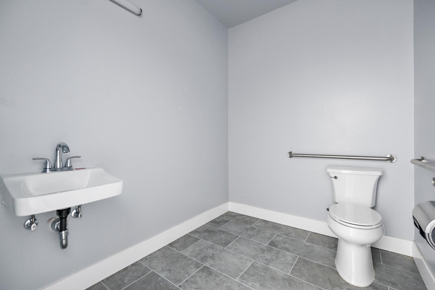 2220 Winchester Boulevard Campbell, CA 95008 - Photo 8 of 26 a bathroom with a sink a toilet and a mirror