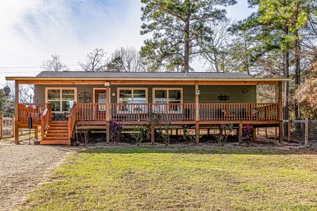 swimming pool view with a outdoor seating